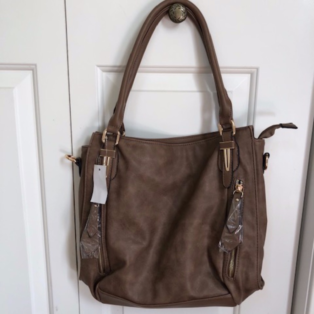 Brown soft leather feel purse. NWT.